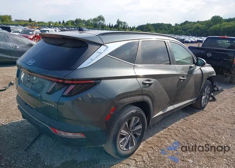 2022 Hyundai Tucson Blue from USA, damaged, VIN KM8JBCA18NU075192